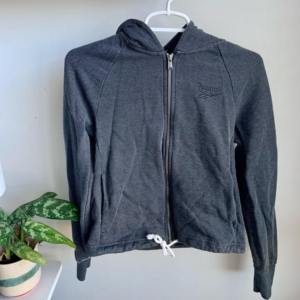 Slightly cropped Reebok zip up! Good sized hoodie, as well!